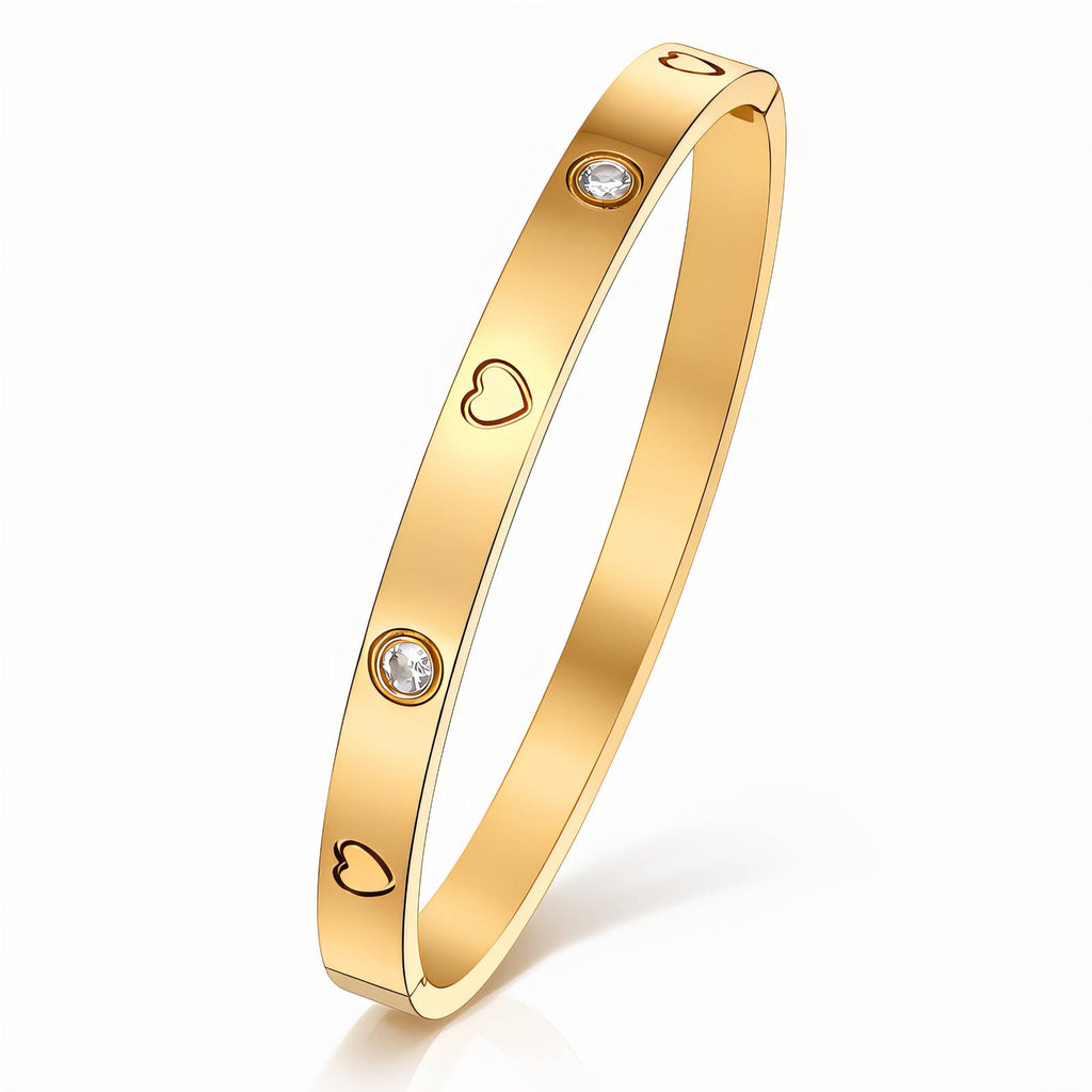 Gold bracelet with heart and diamond designs 